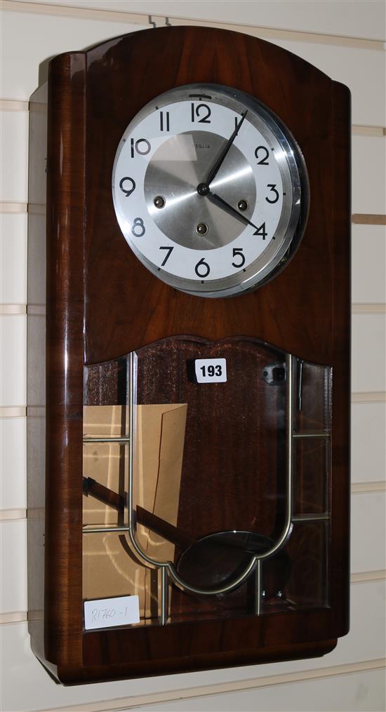 A 1950s Veglia walnut wall clock, height 61cm